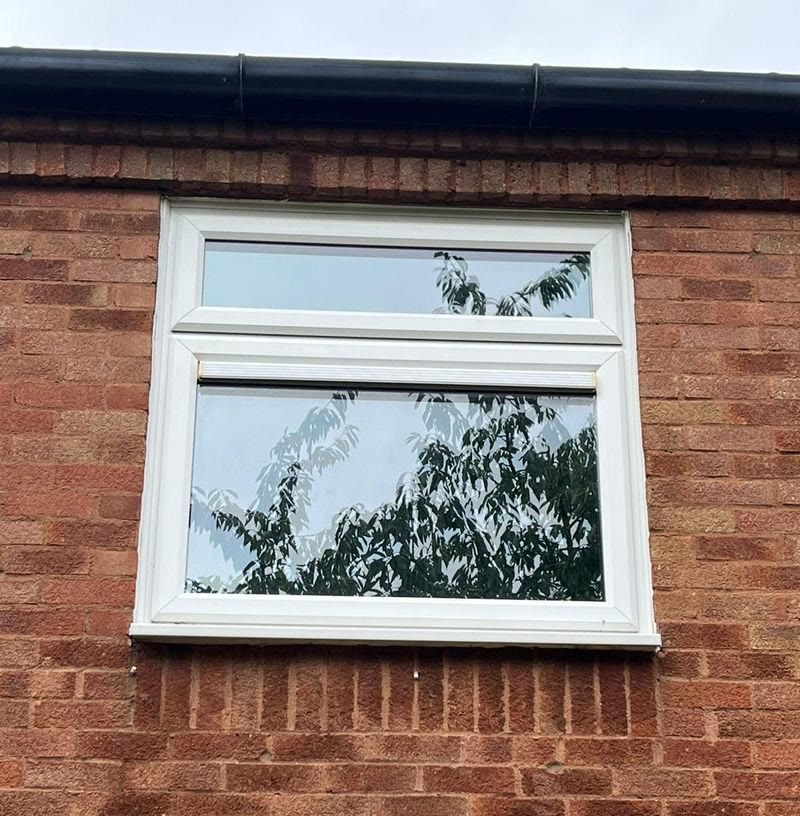 Clean window on red brick after cleaning